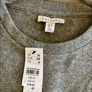 Top Shop (new with original tag). Sweater crop top. Size 6.
